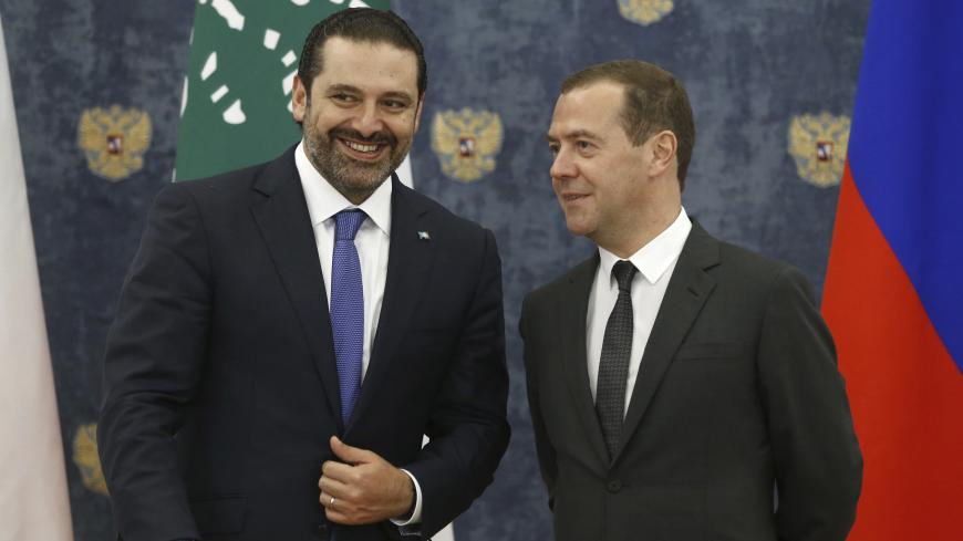 Russian Prime Minister Dmitry Medvedev (R) and his Lebanese counterpart Saad al-Hariri attend a signing ceremony outside Moscow, Russia September 12, 2017. Sputnik/Dmitry Astakhov/Pool via REUTERS  ATTENTION EDITORS - THIS IMAGE WAS PROVIDED BY A THIRD PARTY. - UP1ED9C1AWH0N