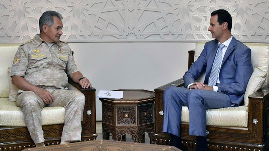 Russian Defence Minister Sergei Shoigu meets with Syrian President Bashar al-Assad in Damascus, Syria September 12, 2017. SANA/Handout via REUTERS ATTENTION EDITORS - THIS PICTURE WAS PROVIDED BY A THIRD PARTY. REUTERS IS UNABLE TO INDEPENDENTLY VERIFY THE AUTHENTICITY, CONTENT, LOCATION OR DATE OF THIS IMAGE. - RC18742B64B0