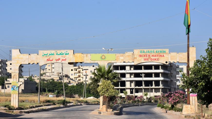 A picture taken on June 9, 2017 shows the main entrance to the city of Afrin, along Syria's northern border with Turkey. / AFP PHOTO / George OURFALIAN        (Photo credit should read GEORGE OURFALIAN/AFP/Getty Images)