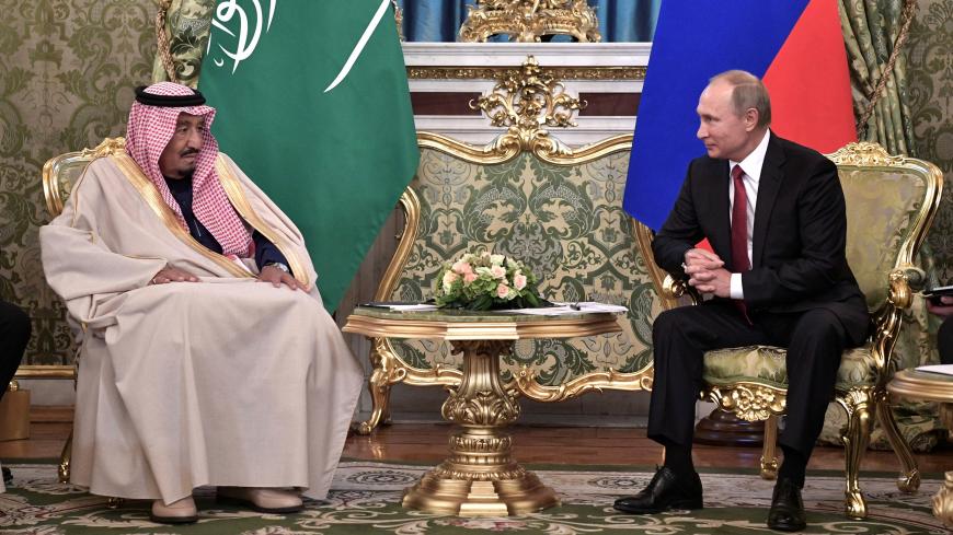 Russian President Vladimir Putin (R) meets with Saudi Arabia's King Salman in the Kremlin in Moscow, Russia October 5, 2017. Sputnik/Alexei Nikolsky/Kremlin via REUTERS ATTENTION EDITORS - THIS IMAGE WAS PROVIDED BY A THIRD PARTY. - RC1C4DF4B090