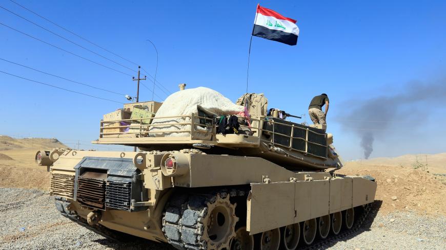 A tank belonging to Iraqi army is seen in Dibis area on the outskirts of Kirkuk, Iraq October 17, 2017. REUTERS/Alaa Al-Marjani - RC1574B11470