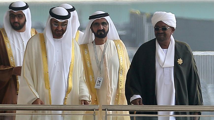 Abu Dhabi Crown Prince Sheikh Mohammed bin Zayed al-Nahayan (2nd L), Prime Minister and Vice-President of the United Arab Emirates and ruler of Dubai Sheikh Mohammed bin Rashid al-Maktoum (2nd R), and Sudan's President Omar al-Bashir (R) attend the opening ceremony of the International Defence Exhibition and Conference (IDEX) in Abu Dhabi, United Arab Emirates February 19, 2017. REUTERS/Stringer - RC1101053F70