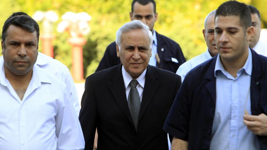 Former Israeli President Moshe Katsav (C) arrives at the Supreme Court in Jerusalem, to hear the verdict of his appeal on a rape conviction, November 10, 2011. Katsav had denied charges he twice raped an aide when he was a cabinet minister in the late 1990s, and molested or sexually harassed two other women who worked for him during his 2000-2007 term as president.       REUTERS/Nir Elias (JERUSALEM - Tags: POLITICS CRIME LAW) - GM1E7BA16NM01