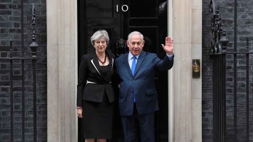 Britain's Prime Minister Theresa May welcomes Israel's Prime Minister Benjamin Netanyahu outside 10 Downing Street in London, Britain, November 2, 2017. REUTERS/Toby Melville - RC1C55270A90