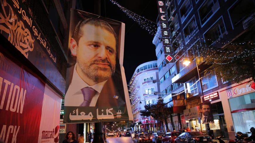 A poster depicting Saad al-Hariri, who has resigned as Lebanon's prime minister is seen in Beirut, Lebanon, November 14, 2017. REUTERS/Jamal Saidi - RC1AA8425E00