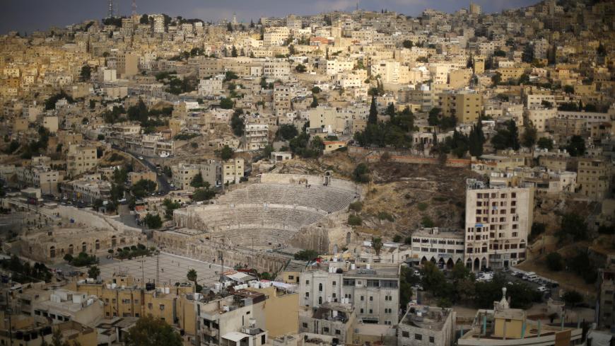 The Roman Amphitheatre is seen in the doan town during tourists visit to the Amman Citadel, an ancient Roman landmark in Amman, Jordan, May 23, 2016. REUTERS/Muhammad Hamed - S1BETFTJPLAA
