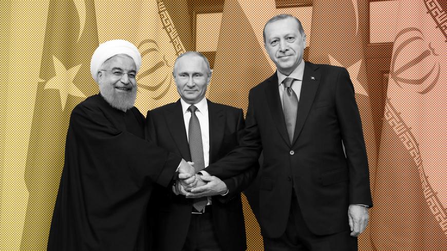 Iran's President Hassan Rouhani, Russia's Vladimir Putin and Turkey's Tayyip Erdogan meet in Sochi, Russia November 22, 2017. Sputnik/Mikhail Metzel/Kremlin via REUTERS ATTENTION EDITORS - THIS IMAGE WAS PROVIDED BY A THIRD PARTY. - RC1A068CD8A0
