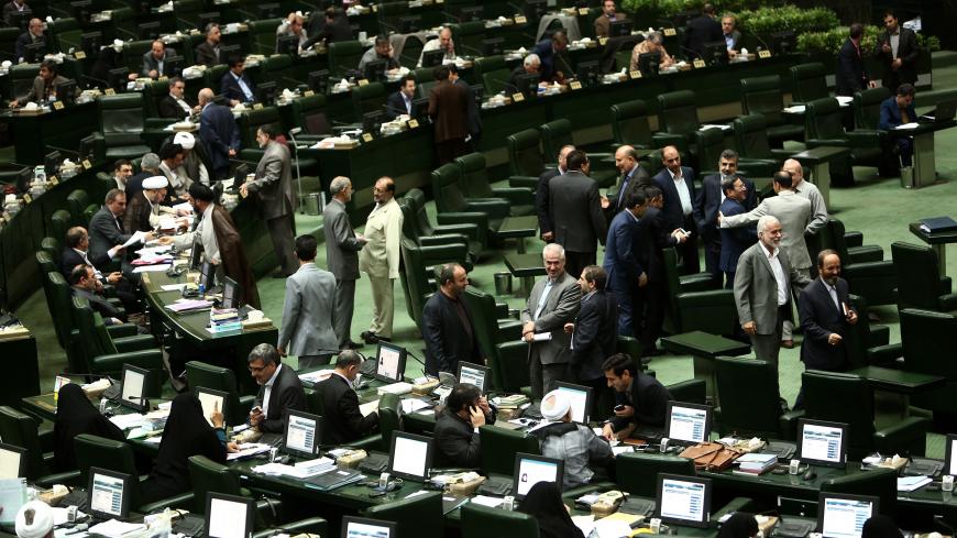 Iranian members of parliament attend a parliamentary session in Tehran on June 23, 2015. Iranian lawmakers passed a bill obliging the government to safeguard the country's "nuclear rights and achievements," despite talks with global powers on curbing the Islamic republic's disputed atomic programme. AFP PHOTO / BEHROUZ MEHRI        (Photo credit should read BEHROUZ MEHRI/AFP/Getty Images)