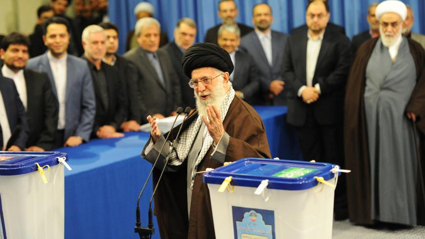 TEHRAN, IRAN - FEBRUARY 26: Iran's Supreme Leader Ayatollah Seyyed Ali Khamenei casts the first ballot in key elections for Parliament and the Assembly of Experts in Tehran, Iran, on February 26, 2016. Mr. Khamenei called on Iranians to vote en masse to "ruin the hopes of the enemies." The vote is essentially a referendum on the agenda of centrist President Hassan Rouhani, whose allies are trying to ease the grip of hardliners over many levers of government. (Photo by Scott Peterson/Getty Images)