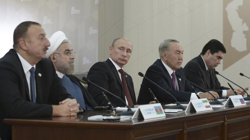 (L-R) Azerbaijan's President Ilham Aliyev, Iran's President Hassan Rouhani, Russia's President Vladimir Putin, Kazakhstan's President Nursultan Nazarbayev and Turkmenistan's President Gurbanguly Berdimuhamedov attend a news conference during a summit of Caspian Sea regional leaders in the southern city of Astrakhan September 29, 2014. REUTERS/Alexei Nikolsky/RIA Novosti/Kremlin (RUSSIA - Tags: POLITICS) THIS IMAGE HAS BEEN SUPPLIED BY A THIRD PARTY. IT IS DISTRIBUTED, EXACTLY AS RECEIVED BY REUTERS, AS A SE