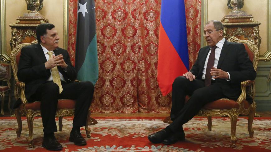 Russian Foreign Minister Sergei Lavrov (R) meets with Libyan Prime Minister Fayez Seraj in Moscow, Russia, March 2, 2017. REUTERS/Sergei Karpukhin - LR1ED3214Q2X6