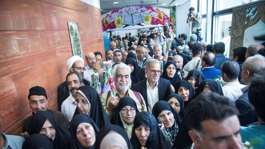 Iranian pilgrims wait at the Imam Khomeini Airport as they depart for the annual haj pilgrimage to the holy city of Mecca, in Tehran, Iran July 31, 2017. Nazanin Tabatabaee Yazdi /TIMA via REUTERS. ATTENTION EDITORS ñ THIS IMAGE HAS BEEN SUPPLIED BY A THIRD PARTY. - RC1534FF7A20