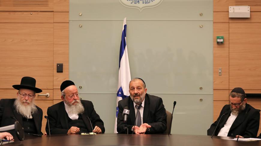Israel's Interior Minister Aryeh Deri (2ndR) the leader of the ultra-Orthodox Shas party, gestures as he sits next to Israel's Health Minister, Yaakov Litzman (L) from United Torah Judaism party, and Moshe Gafni (R) a parliament member from United Torah Judaism party, during a meeting at the Knesset, Israel's parliament, in Jerusalem September 13, 2017. REUTERS/Ammar Awad - RC142C916550