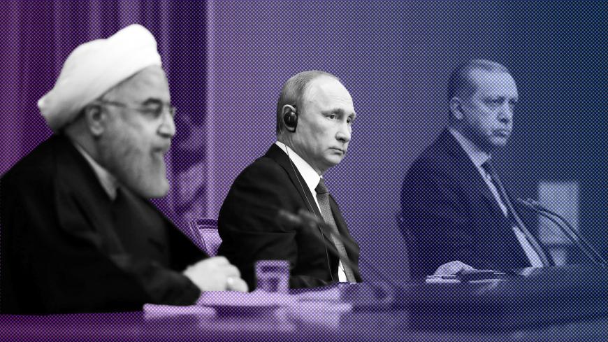 Iran's President Hassan Rouhani together with his counterparts, Russia's Vladimir Putin and Turkey's Tayyip Erdogan, attend a joint news conference following their meeting in Sochi, Russia November 22, 2017. Sputnik/Mikhail Klimentyev/Kremlin via REUTERS ATTENTION EDITORS - THIS IMAGE WAS PROVIDED BY A THIRD PARTY. - RC1D16F4FF70