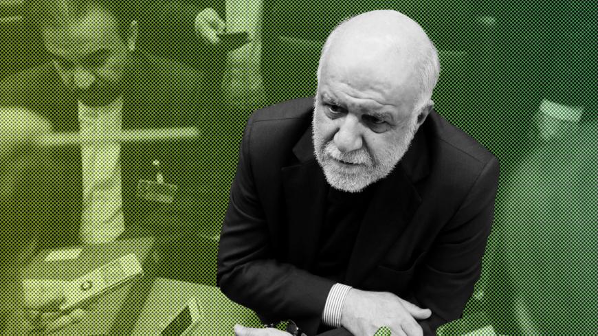Iran's Oil Minister Bijan Zanganeh talks to journalists at the beginning of an OPEC meeting in Vienna, Austria, November 30, 2017. REUTERS/Heinz-Peter Bader - RC18ECEC9B80