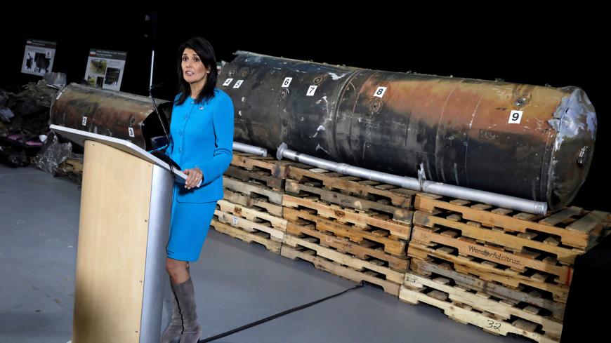 U.S. Ambassador to the United Nations Nikki Haley briefs the media in front of remains of Iranian "Qiam" ballistic missile provided by Pentagon at Joint Base Anacostia-Bolling in Washington, U.S., December 14, 2017. REUTERS/Yuri Gripas - RC1942011B60