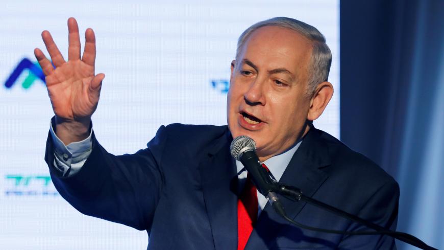 Israeli Prime Minister Benjamin Netanyahu speaks during a dedication ceremony of the "Assuta" hospital in Ashdod, Israel December 21, 2017. REUTERS/Amir Cohen - RC19CD5B2620