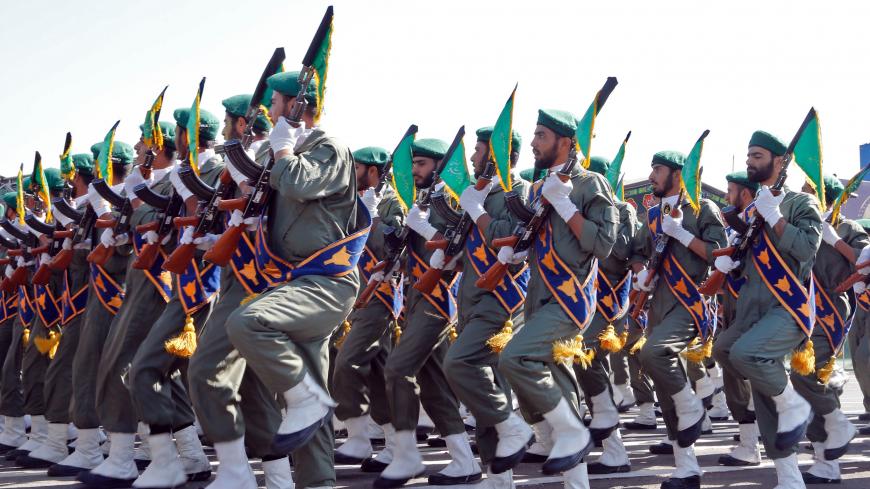 Iranian soldiers march during the annual military parade marking the anniversary of the outbreak of its devastating 1980-1988 war with Saddam Hussein's Iraq, on September 22,2017 in Tehran.
President Hassan Rouhani vowed that Iran would boost its ballistic missile capabilities despite criticism from the United States and also France. / AFP PHOTO / str        (Photo credit should read STR/AFP/Getty Images)