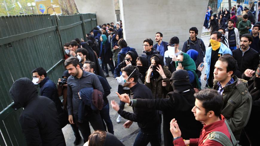 Iranian students protest at the University of Tehran during a demonstration driven by anger over economic problems, in the capital Tehran on December 30, 2017.
Students protested in a third day of demonstrations, videos on social media showed, but were outnumbered by counter-demonstrators.  / AFP PHOTO / STR        (Photo credit should read STR/AFP/Getty Images)