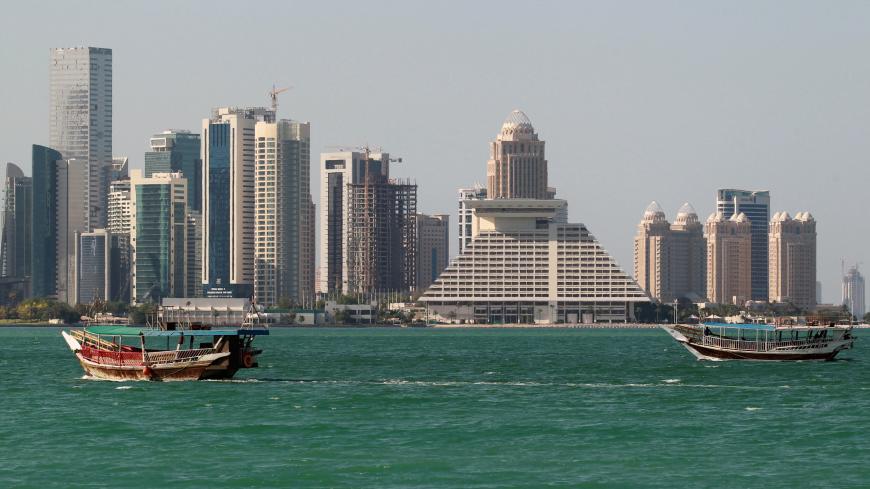 Buildings are seen on a coast line in Doha, Qatar June 5, 2017. REUTERS/Stringer - RC19BDD1CE80