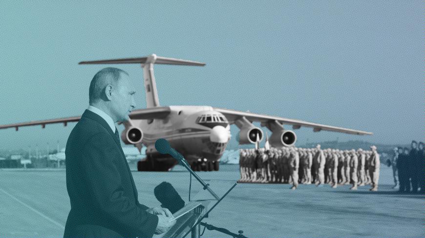 FILE PHOTO: Russian President Vladimir Putin addresses servicemen as he visits the Hmeymim air base in Latakia Province, Syria December 11, 2017.  Sputnik/Mikhail Klimentyev/Sputnik via REUTERS  ATTENTION EDITORS - THIS IMAGE WAS PROVIDED BY A THIRD PARTY/File Photo - RC13F85C4140