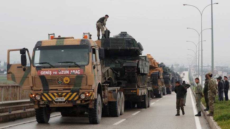 A Turkish military convoy arrives at an army base in the border town of Reyhanli near the Turkish-Syrian border in Hatay province, Turkey January 17, 2018. REUTERS/Osman Orsal - RC12B0BC2360