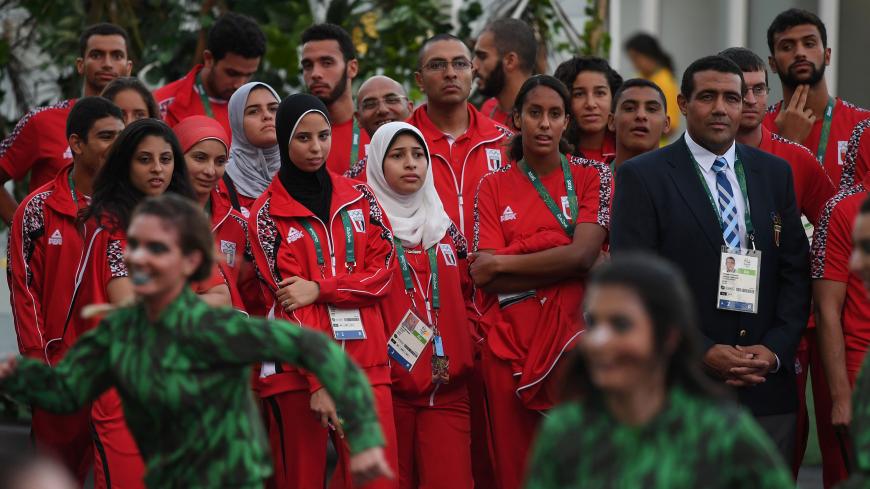 Members of Egypt's Olympic team attend a welcome ceremony held at the athletes village of the Rio 2016 Olympic Games on August 1, 2016. / AFP / Mark RALSTON        (Photo credit should read MARK RALSTON/AFP/Getty Images)