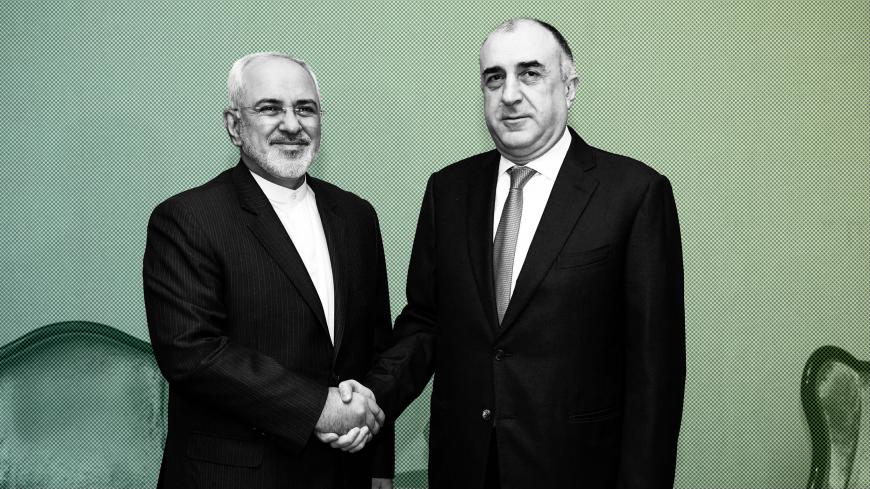 Azerbaijan's Foreign Minister Elmar Mammadyarov (R) meets with his Iranian counterpart Mohammad Javad Zarif in Baku on December 20, 2017.
Foreign Ministers of Azerbaijan, Iran and Turkey hold the fifth trilateral meeting in Baku. / AFP PHOTO / Tofik BABAYEV        (Photo credit should read TOFIK BABAYEV/AFP/Getty Images)