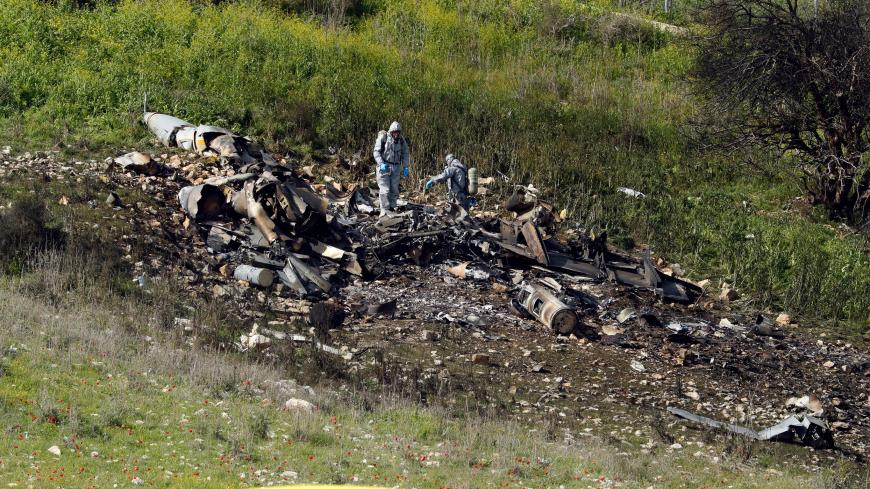 A picture taken in the northern Israeli Kibbutz of Harduf on February 10, 2018, shows the remains of an Israel F-16 that crashed after coming under fire by Syrian air defences during attacks against "Iranian targets" in the war-torn country. / AFP PHOTO / Jack GUEZ        (Photo credit should read JACK GUEZ/AFP/Getty Images)