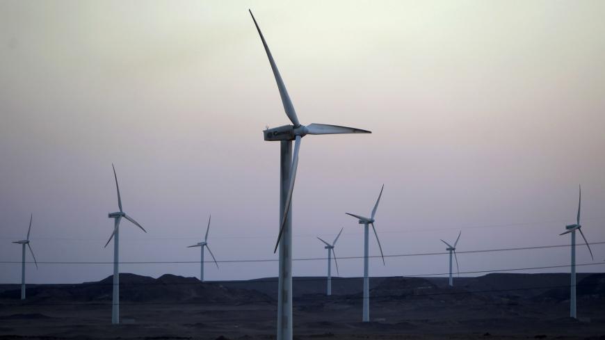 Wind turbines, which generate renewable energy, are seen on the Zafarana Wind Farm, near El Ain El Sokhna port in Suez, 140 km (87 miles) east of Cairo July 6, 2012. Picture taken July 6, 2012. REUTERS/Amr Abdallah Dalsh  (EGYPT - Tags: ENERGY BUSINESS) - GM1E8770KV401
