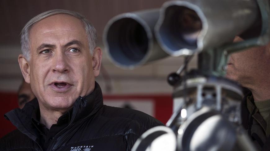 Israel's Prime Minister Benjamin Netanyahu visits a military outpost on Mount Hermon in the Golan Heights over looking the Israel-Syria border February 4, 2015. REUTERS/Baz Ratner (ISRAEL - Tags: POLITICS CIVIL UNREST CONFLICT) - GM1EB25051I01