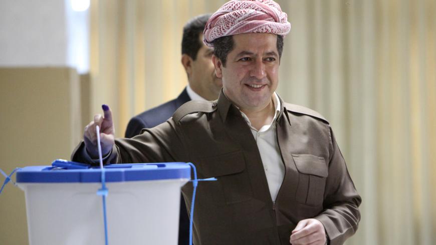 Masrour Barzani, head of the Iraqi Kurdish region's national Security Council, casts his vote during Kurds independence referendum in Erbil, Iraq September 25, 2017. REUTERS/Azad Lashkari - RC16957934A0