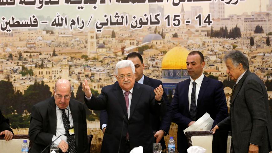 Palestinian President Mahmoud Abbas arrives to attend the meeting of the Palestinian Central Council in the West Bank city of Ramallah January 14, 2018. REUTERS/Mohamad Torokman - RC1616E526F0