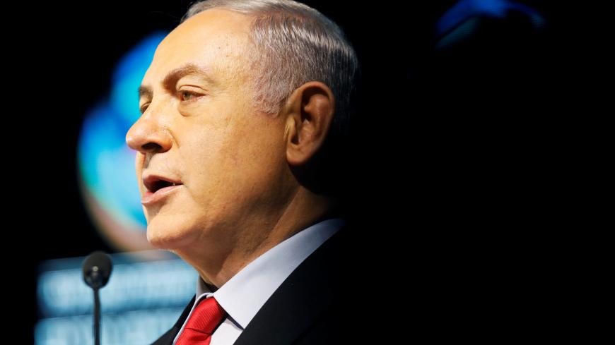 Israeli Prime Minister Benjamin Netanyahu speaks during the Muni World 2018 conference in Tel Aviv, Israel February 14, 2018. REUTERS/Nir Elias - RC1AB4EAB8D0