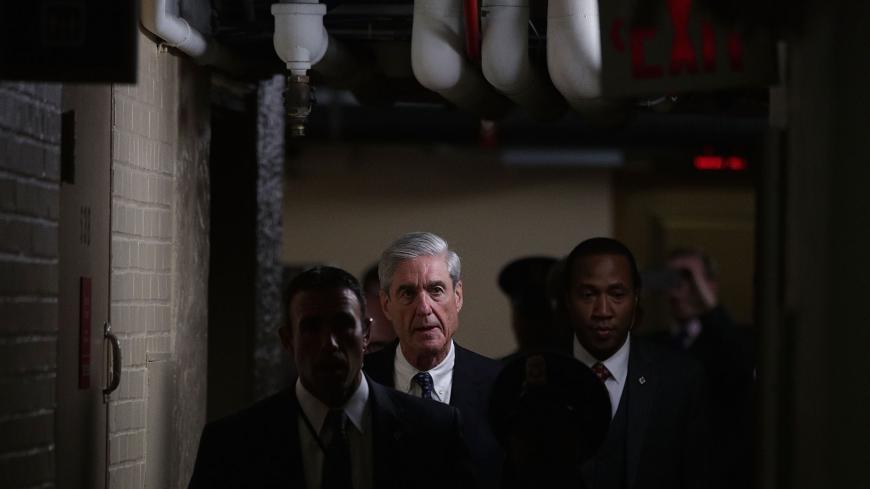 WASHINGTON, DC - JUNE 21:  Special counsel Robert Mueller (C) leaves after a closed meeting with members of the Senate Judiciary Committee June 21, 2017 at the Capitol in Washington, DC. The committee meets with Mueller to discuss the firing of former FBI Director James Comey.  (Photo by Alex Wong/Getty Images)