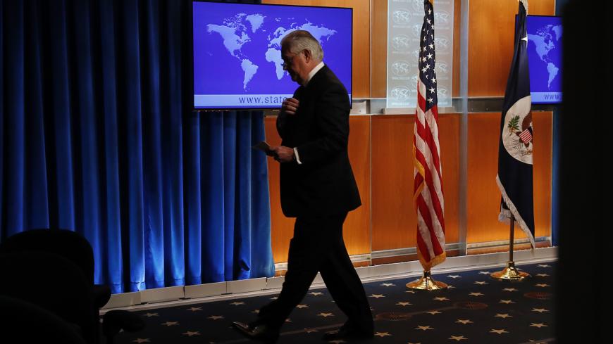 U.S. Secretary of State Rex Tillerson departs after speaking to the media at the U.S. State Department after being fired by President Donald Trump in Washington, U.S. March 13, 2018. REUTERS/Leah Millis - HP1EE3D1F7U48