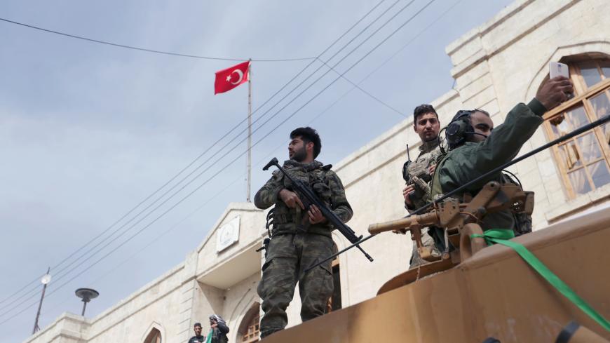 Turkish forces and Free Syrian Army are deployed in Afrin, Syria March 18, 2018. REUTERS/ Khalil Ashawi - RC1526525050