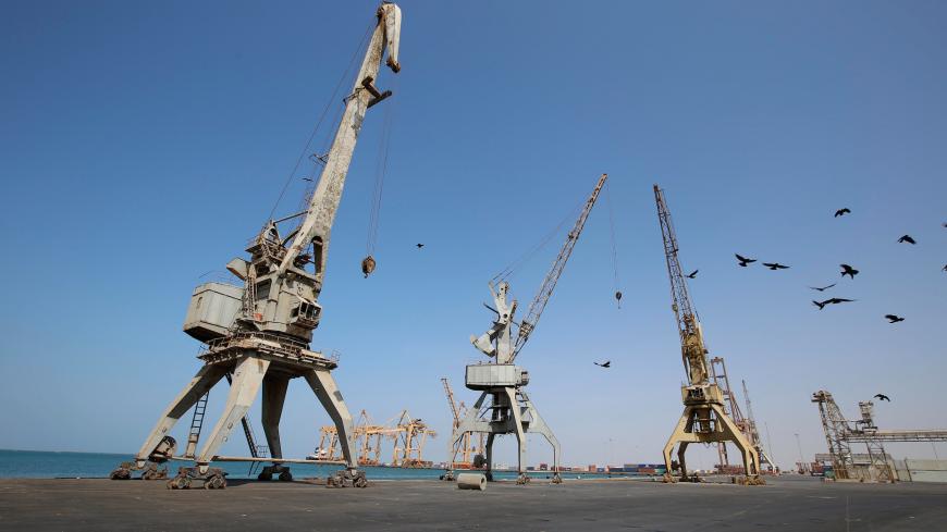 A view of cranes, damaged by air strikes, at the container terminal of the Red Sea port of Hodeidah, Yemen November 30, 2017. REUTERS/Abduljabbar Zeyad - RC1FAA3EE280