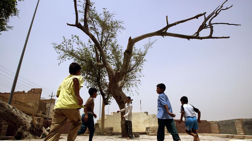 Iraqi children gather around what is believed to be Adam's tree in the
Garden of Eden in Al Qurna, Iraq, May 19, 2003. Eden, at the confluence
of the Euphrates and the Tigris rivers, known as the cradle of mankind,
is now a ruined home to the dead Adam's tree which was cultivated by Al
Qurna's elders for centuries at this location. REUTERS/Damir Sagolj

DS - RP3DRILTDYAA