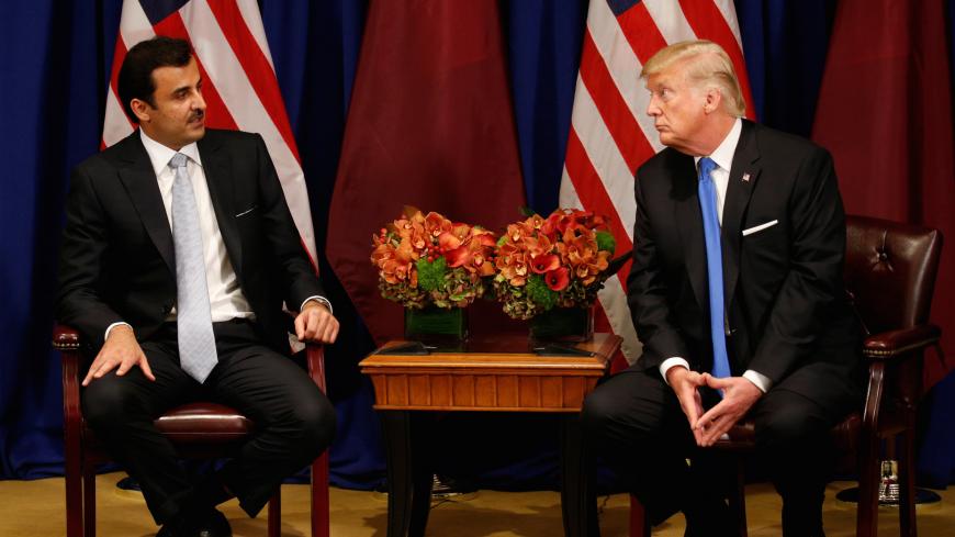 U.S. President Donald Trump meets with Qatar's Emir Sheikh Tamim bin Hamad al-Thani in New York, U.S., September 19, 2017. REUTERS/Kevin Lamarque - RC1EC612CAF0