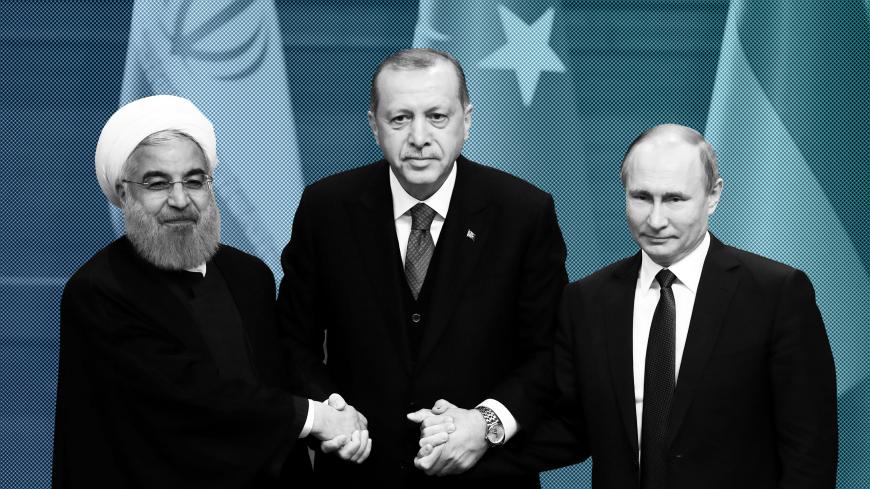 Presidents Hassan Rouhani of Iran, Tayyip Erdogan of Turkey and Vladimir Putin of Russia hold a joint news conference after their meeting in Ankara, Turkey April 4, 2018. REUTERS/Umit Bektas - RC15EBBB9000
