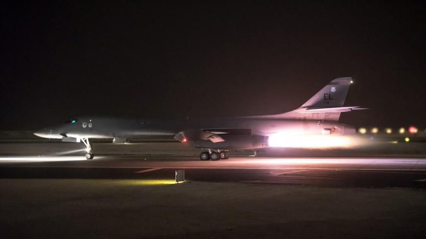 A U.S. Air Force B-1B Lancer, deployed to Al Udeid Air Base, launches a strike as part of the multinational response to Syria's use of chemical weapons is seen in this image from Al Udeid Air Base, Doha, Qatar released on April 14, 2018. U.S. Air Force/Handout via REUTERS. ATTENTION EDITORS - THIS IMAGE WAS PROVIDED BY A THIRD PARTY - RC1E73E5B3E0