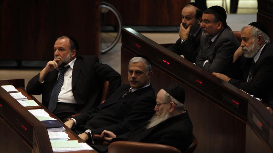 Members from Jewish religious parties attend a session of the Knesset, the Israeli parliament, in Jerusalem December 15, 2010. The session was held to debate a bill that if passed into law, would allow the state to certify the validity of all conversions to Judaism conducted by the Israeli army without the Chief Rabbinate's approval. The bill passed its preliminary reading on Wednesday. The political debate over the legislation underscored divisions on religious issues within Prime Minister Benjamin Netanya