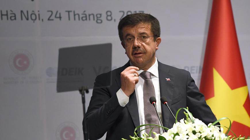 Turkey's Minister of Economy Nihat Zeybekci speaks at the Vietnam-Turkey Business Forum in Hanoi on August 24, 2017. 
Turkey's Prime Minister Binali Yildirim and Zeybekci are on a three-day official visit to Vietnam focused on fostering closer bilateral ties. / AFP PHOTO / HOANG DINH Nam        (Photo credit should read HOANG DINH NAM/AFP/Getty Images)