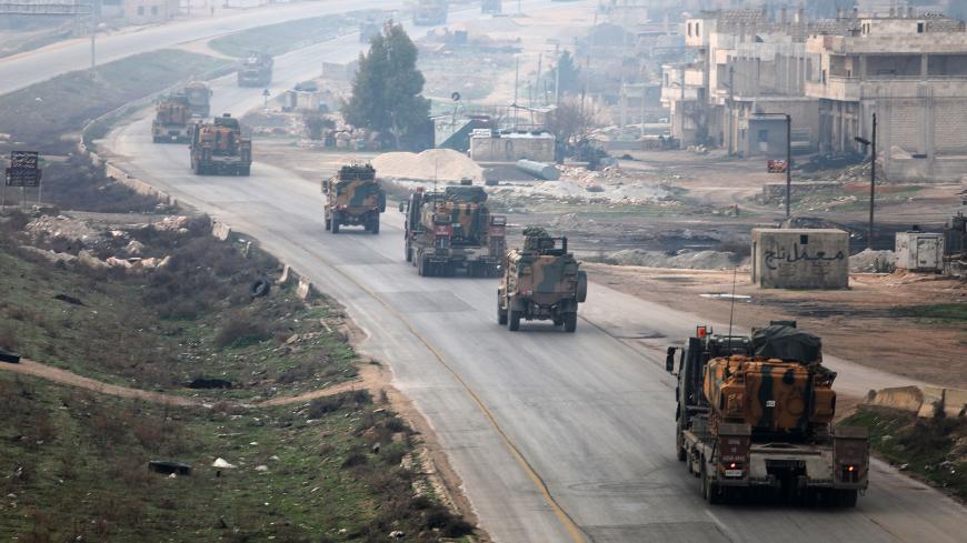 A picture taken on February 15, 2018 shows a Turkish military convoy driving through Syria's northwestern Idlib province.

 / AFP PHOTO / OMAR HAJ KADOUR        (Photo credit should read OMAR HAJ KADOUR/AFP/Getty Images)