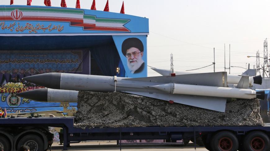 An Iranian military truck carries surface-to-air missiles past a portrait of Iran's Supreme Leader Ayatollah Ali Khamenei during a parade on the occasion of the country's annual army day on April 18, 2018, in Tehran.
President Hassan Rouhani said during the parade that Iran "does not intend any aggression" against its neighbours but will continue to produce all the weapons it needs for its defence. / AFP PHOTO / ATTA KENARE        (Photo credit should read ATTA KENARE/AFP/Getty Images)