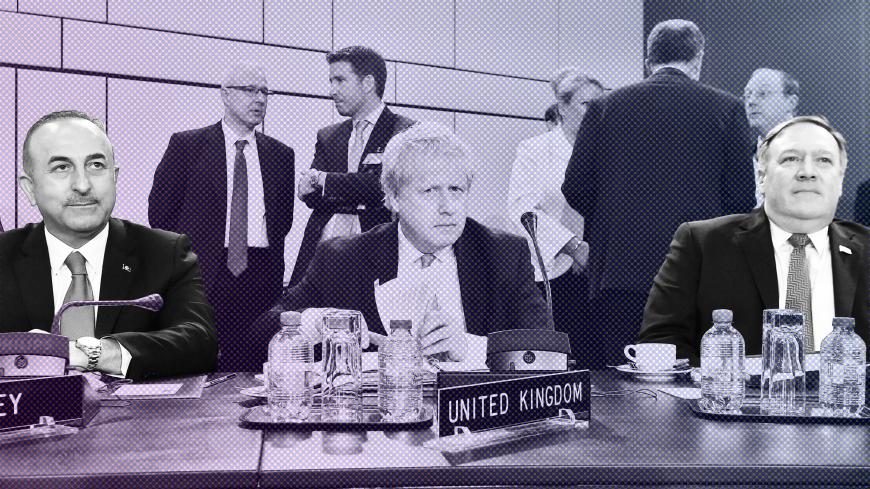 (From L) Turkey's Foreign Affairs minister Mevlut Cavusoglu, British Foreign Secretary Boris Johnson and US Secretary of State Mike Pompeo sit at the opening of a Foreign ministers meeting at the Nato headquarters in Brussels on April 27 2018. (Photo by JOHN THYS / AFP)        (Photo credit should read JOHN THYS/AFP/Getty Images)
