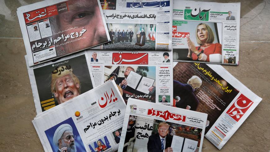 Newspapers in Tehran on May 9, 2018 headline the US' withdrawal from the nuclear deal. - Iran's press today condemned Trump's withdrawal from a multi-party nuclear deal but was divided over whether Tehran should react with patience or withdraw itself. (Photo by ATTA KENARE / AFP)        (Photo credit should read ATTA KENARE/AFP/Getty Images)