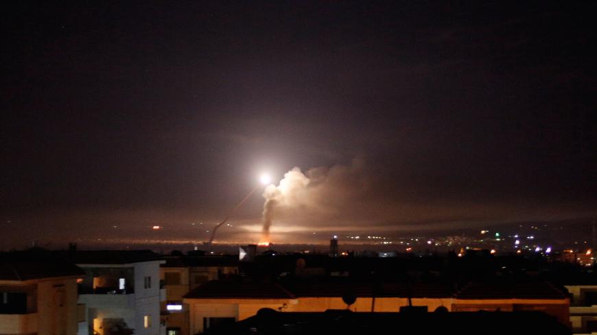 Missile fire is seen from Damascus, Syria May 10, 2018. REUTERS/Omar Sanadiki - RC13F692C3F0