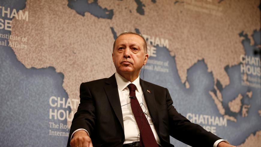 The President of Turkey, Recep Tayyip Erdogan, listens at Chatham House in central London, Britain May 14, 2018. REUTERS/Henry Nicholls - RC1E66A36BD0